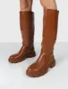 Sabrina Tan Knee High Chunky Sole Boots sold by Public Desire