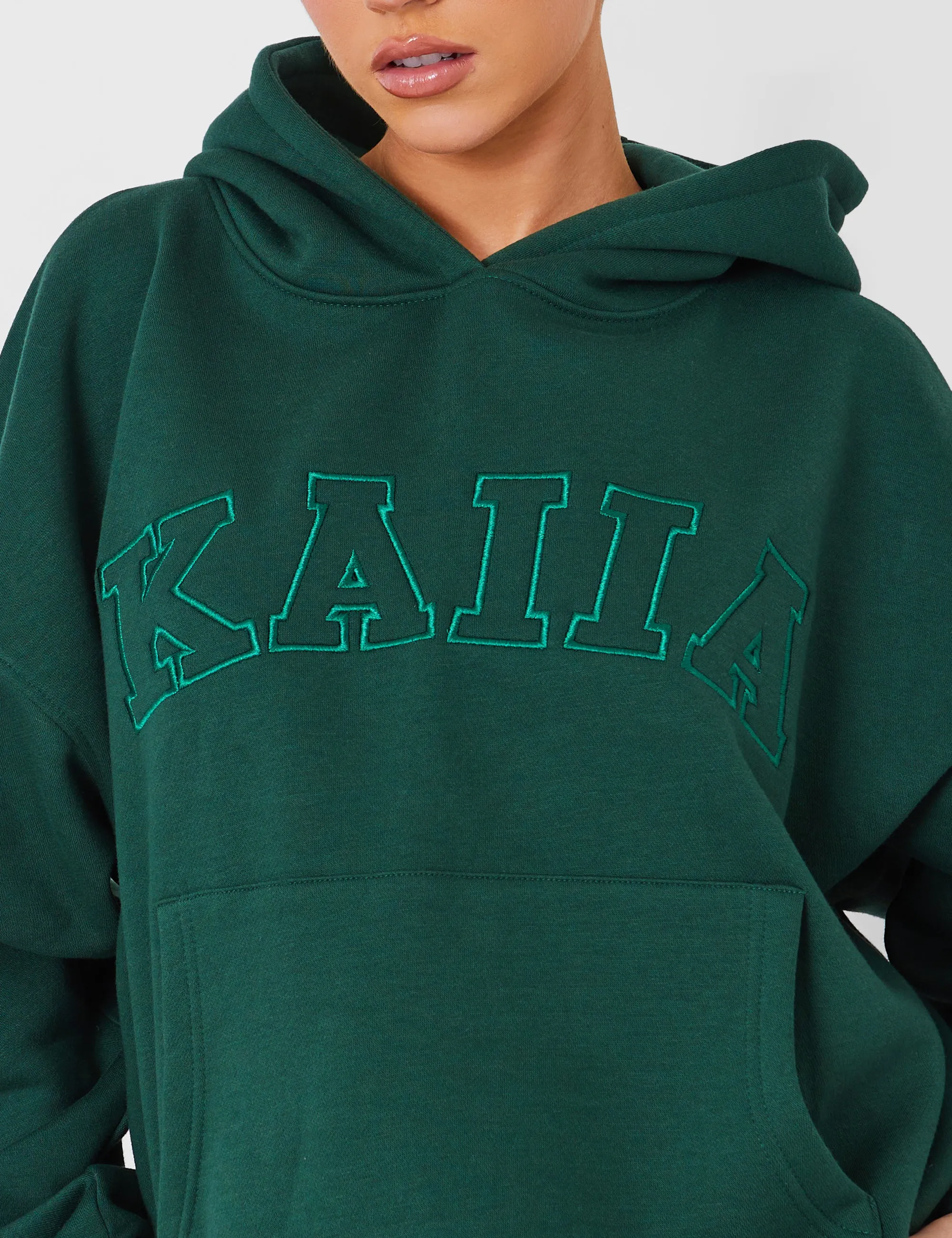 Kaiia Oversized Logo Hoodie in Dark Green sold by Public Desire product image thumbnail 2