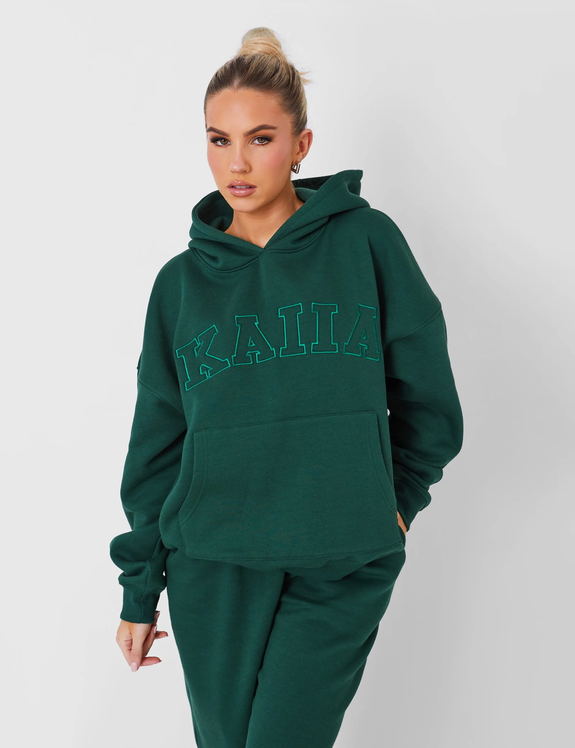 Kaiia Oversized Logo Hoodie in Dark Green sold by Public Desire