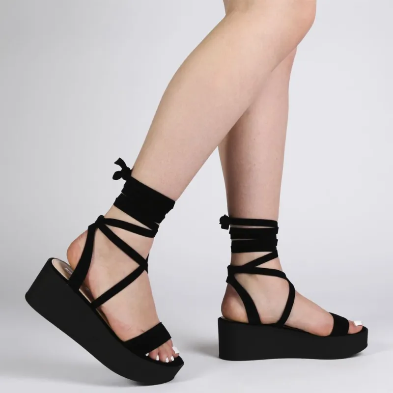 Diya Flatform Sandals in Black Faux Suede sold by Public Desire