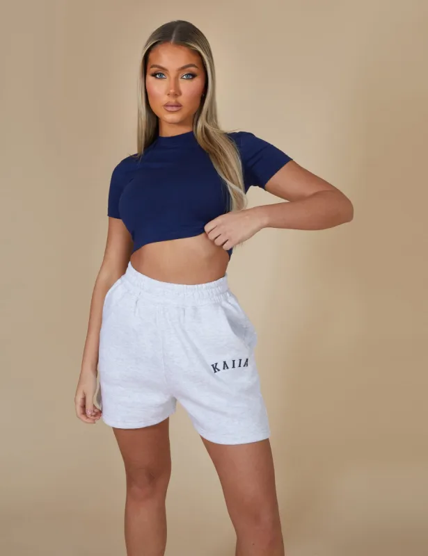 Kaiia Cropped Baby T-shirt In Navy sold by Public Desire