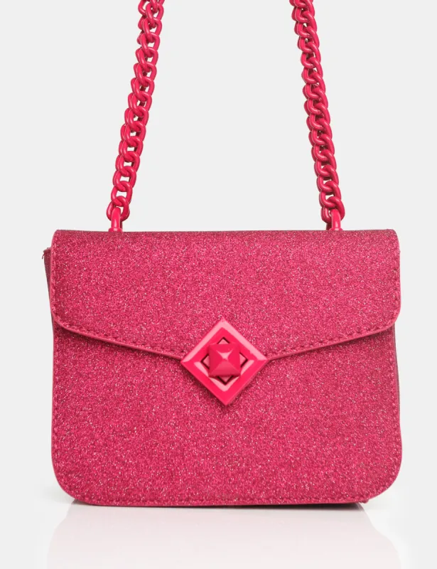 The Pixie Hot Pink Glitter Bag Chain Detail Shoulder Bag sold by Public Desire