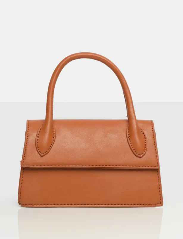 The Hailey Tan PU One Handle Mini Bag sold by Public Desire