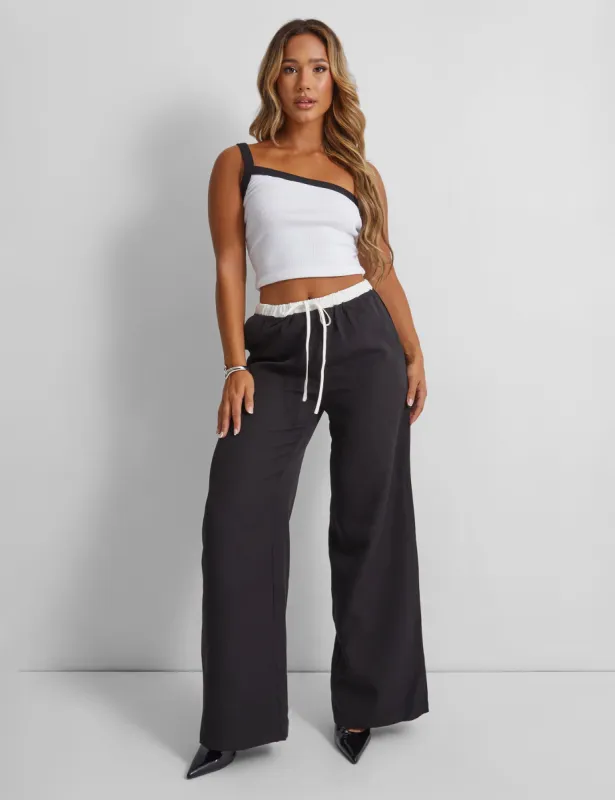 Kaiia Wide Leg Contrast Waist Wide Leg Trousers in Black and White sold by Public Desire