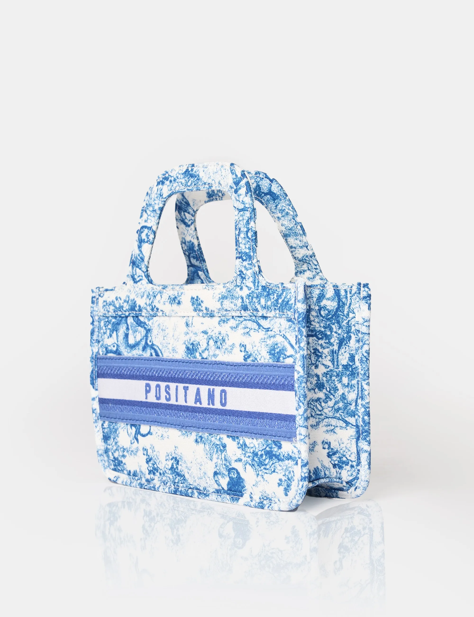 The Positano Blue Mini Canvas Tote Bag sold by Public Desire