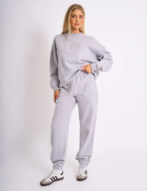 Kaiia Embossed Logo Cuffed Joggers Grey Marl sold by Public Desire