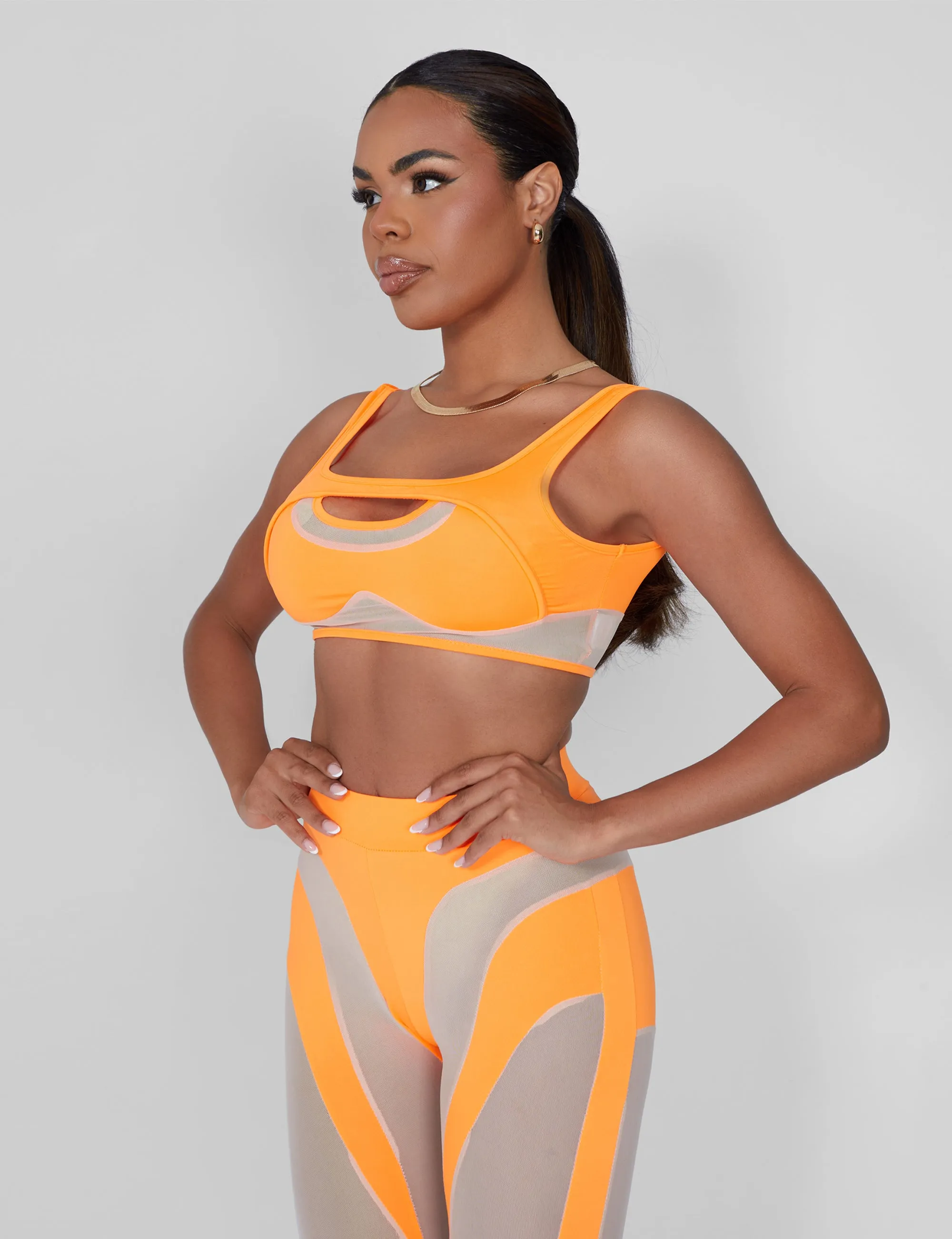 Mesh Illusion Insert Sleeveless Crop Top Orange sold by Public Desire