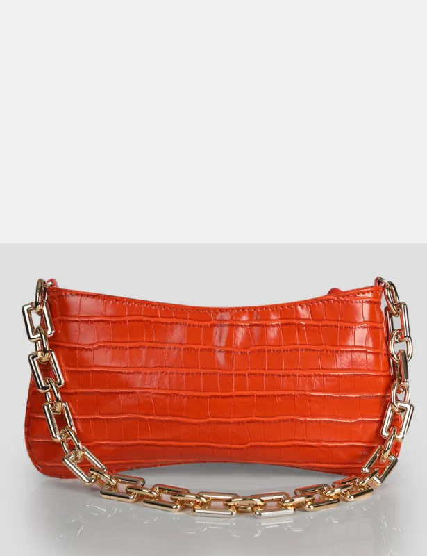The Sadie Orange Croc Chain Detail Shoulder Bag sold by Public Desire