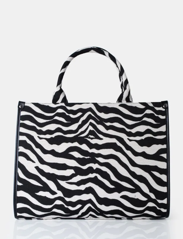 The Bali Zebra Print Canvas Tote Bag sold by Public Desire