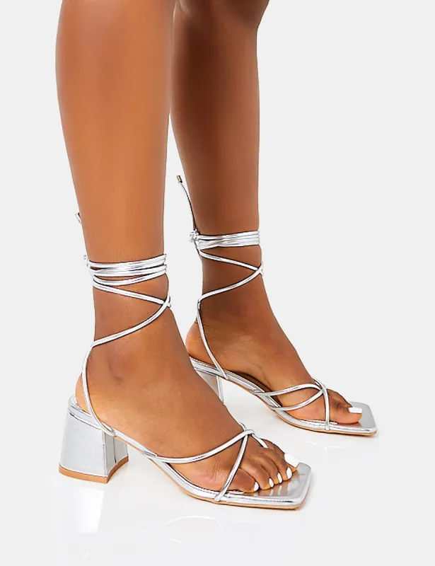 Aerin Wide Fit Silver Metallic Lace Up Strappy Block Mid Heels sold by Public Desire