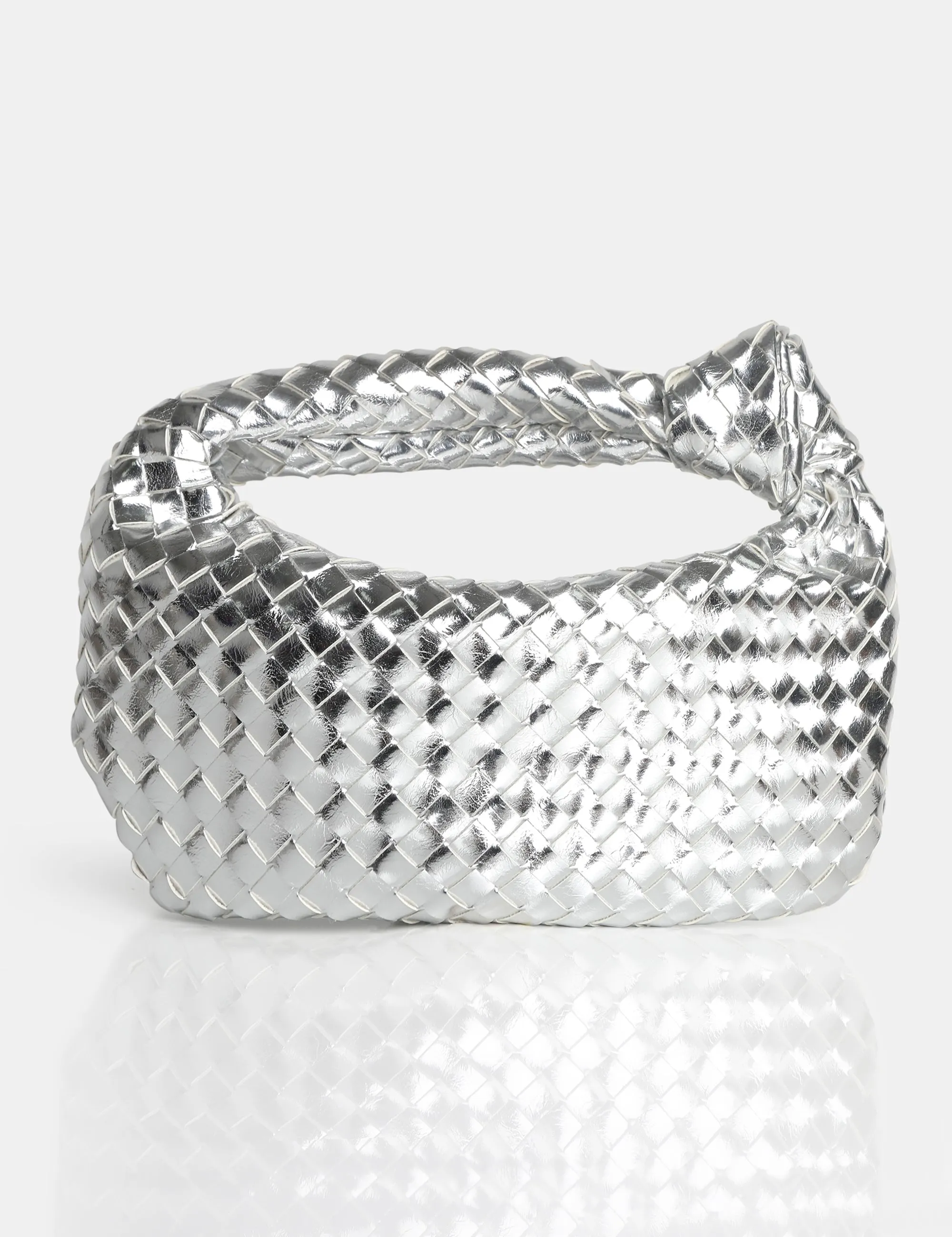 The Blame Metallic Silver Mirror Woven PU Knot Detail Mini Grab Bag sold by Public Desire