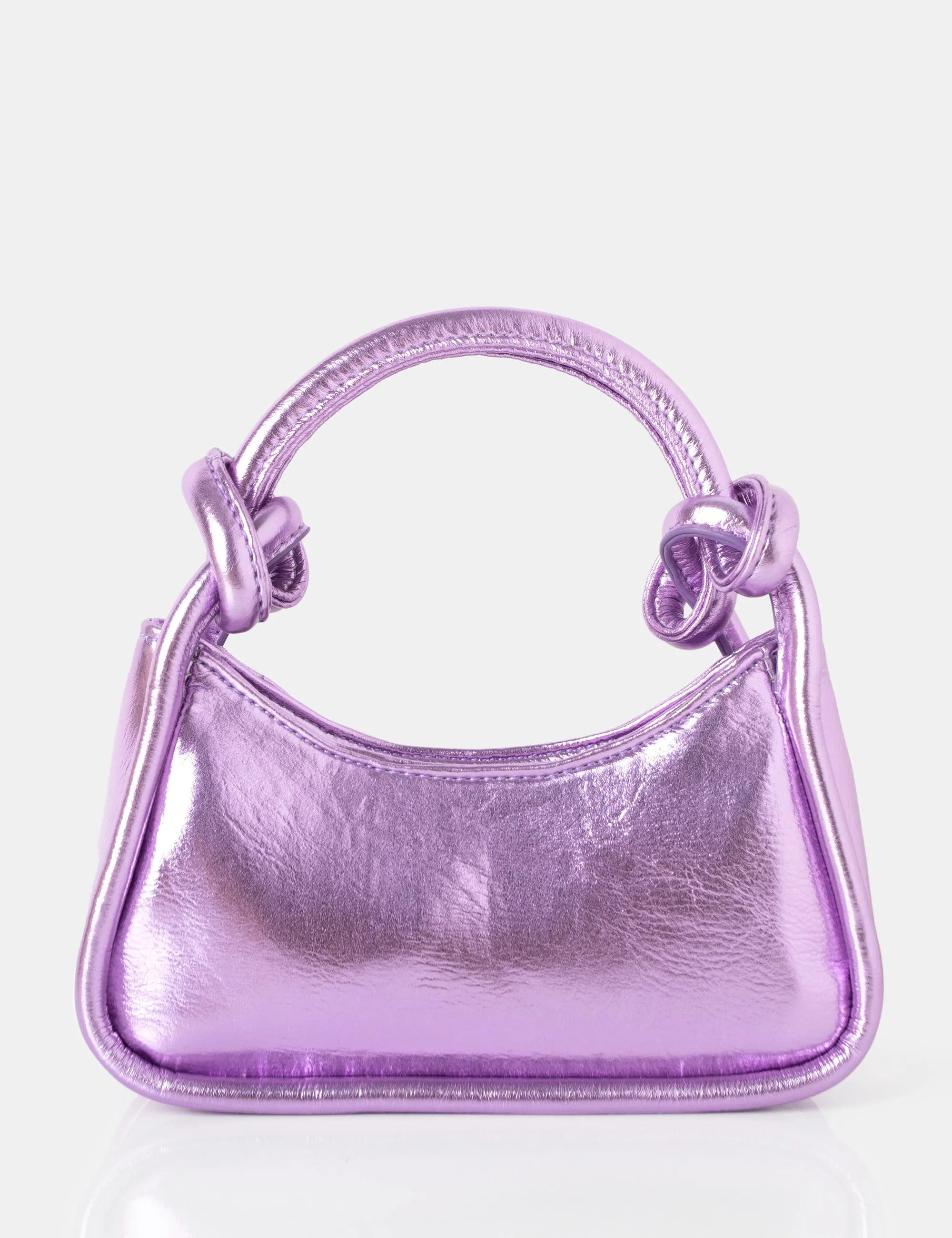 The Knot Metallic Purple Pu Knotted Top Handle Grab Bag sold by Public Desire
