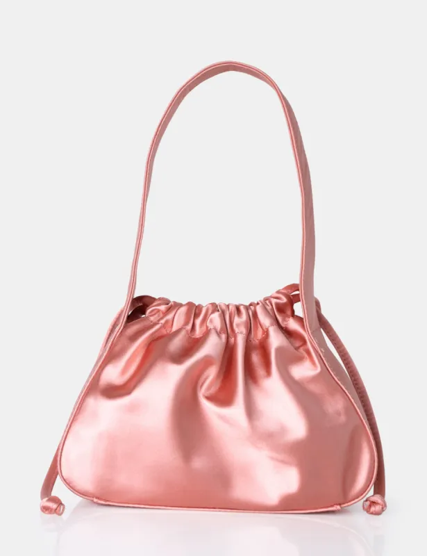 The Ella Peach Satin Grab Bag sold by Public Desire