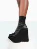 Versus Black Satin Platform Sole Ankle Boots sold by Public Desire