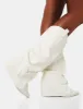 Sheriff White Pu Western Inspired Fold Over Pointed Toe Block Heeled Cowboy Knee High Boots sold by Public Desire