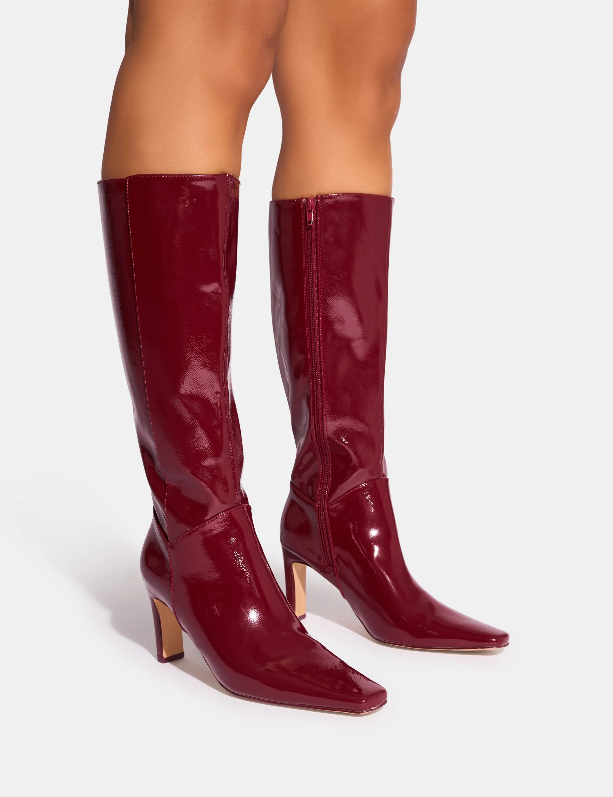 Pose Burgundy Patent Zip Knee High Slim Block Heeled Boots sold by Public Desire