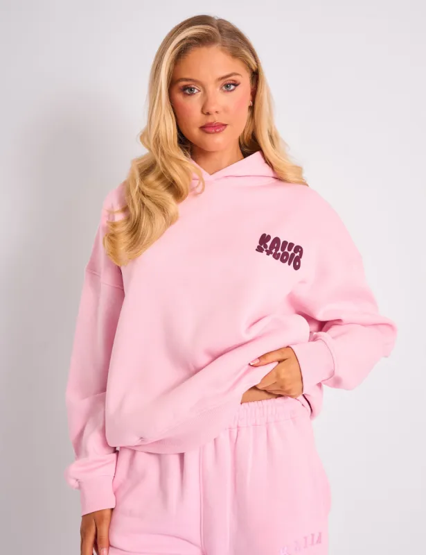 Kaiia Studio Bubble Logo Oversized Hoodie Pink & Plum sold by Public Desire