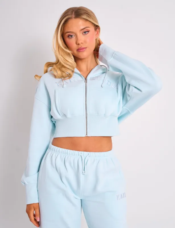 Kaiia Studio Logo Cropped Zip Up Hoodie Light Blue sold by Public Desire