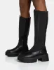 Evergreen Black Pu Wide Fit Knee High Elasticated Detail Chunky Heeled Sole Boots sold by Public Desire