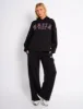 Kaiia Slogan Oversized Hoodie Black & Pink sold by Public Desire
