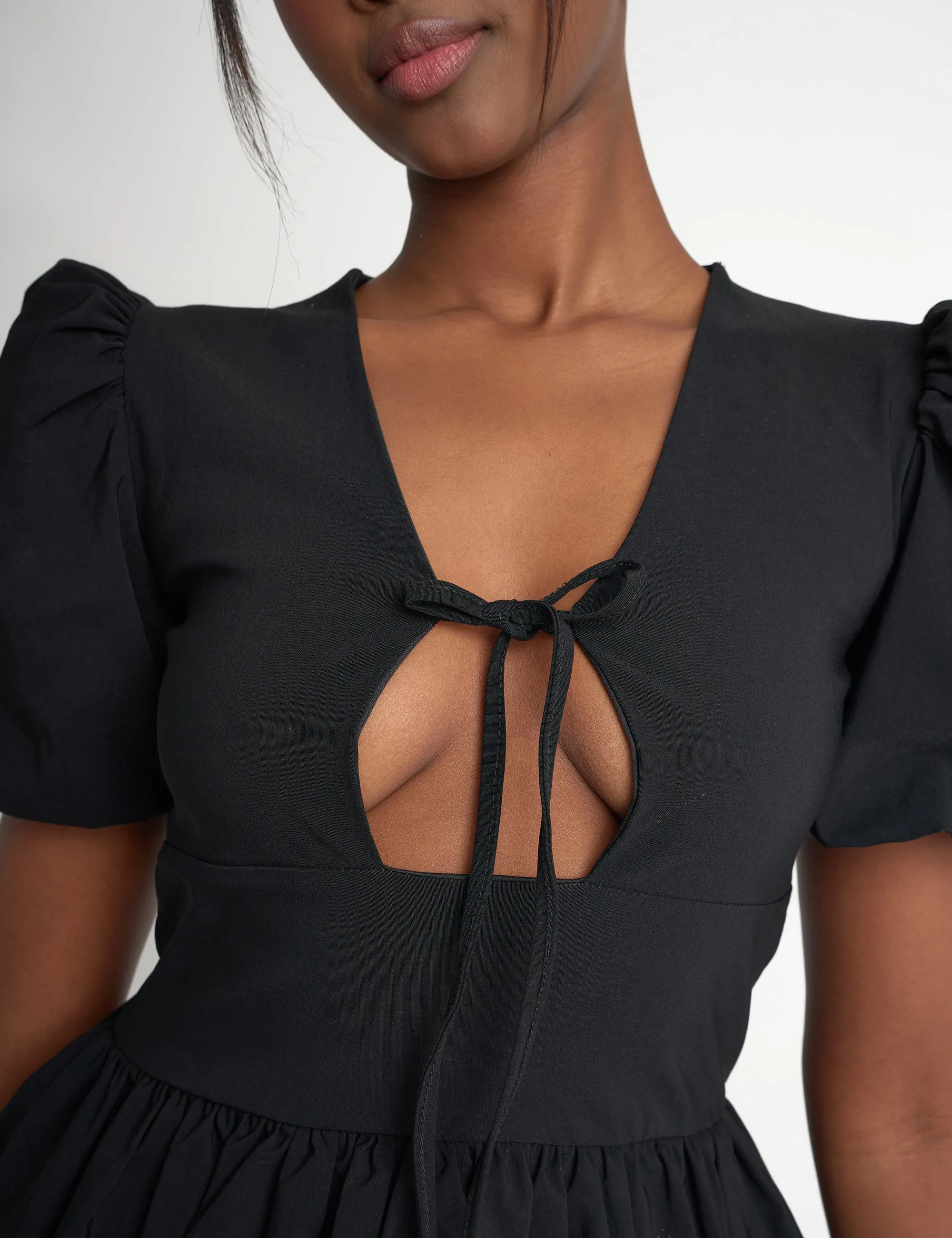 Cut Out Puff Sleeve Bubble Hem Mini Dress Black sold by Public Desire product image thumbnail 4