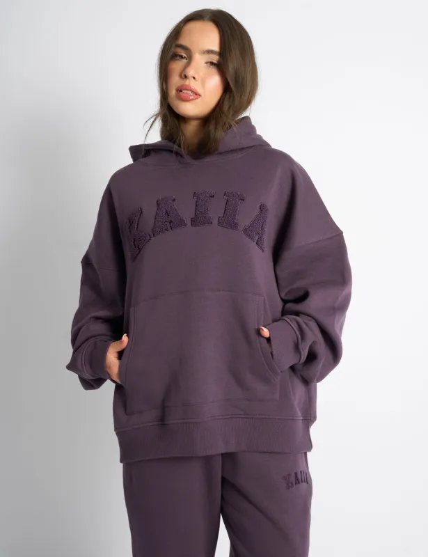 Kaiia Borg Slogan Oversized Hoodie Deep Purple sold by Public Desire