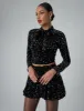 Bow Detail Sequin Long Sleeve Cropped Top Black sold by Public Desire