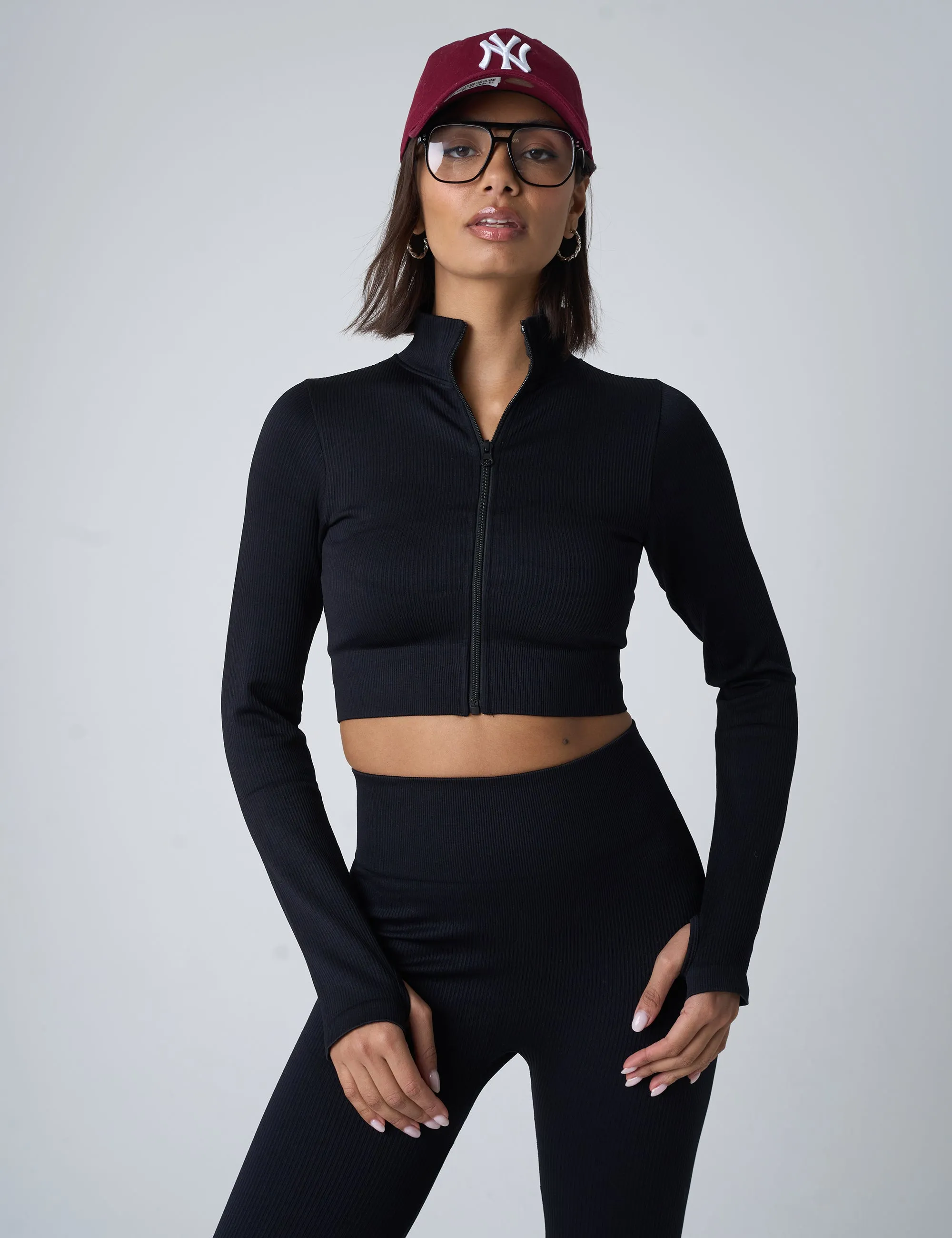 Ribbed Cropped Zip Long Sleeve Top Black sold by Public Desire