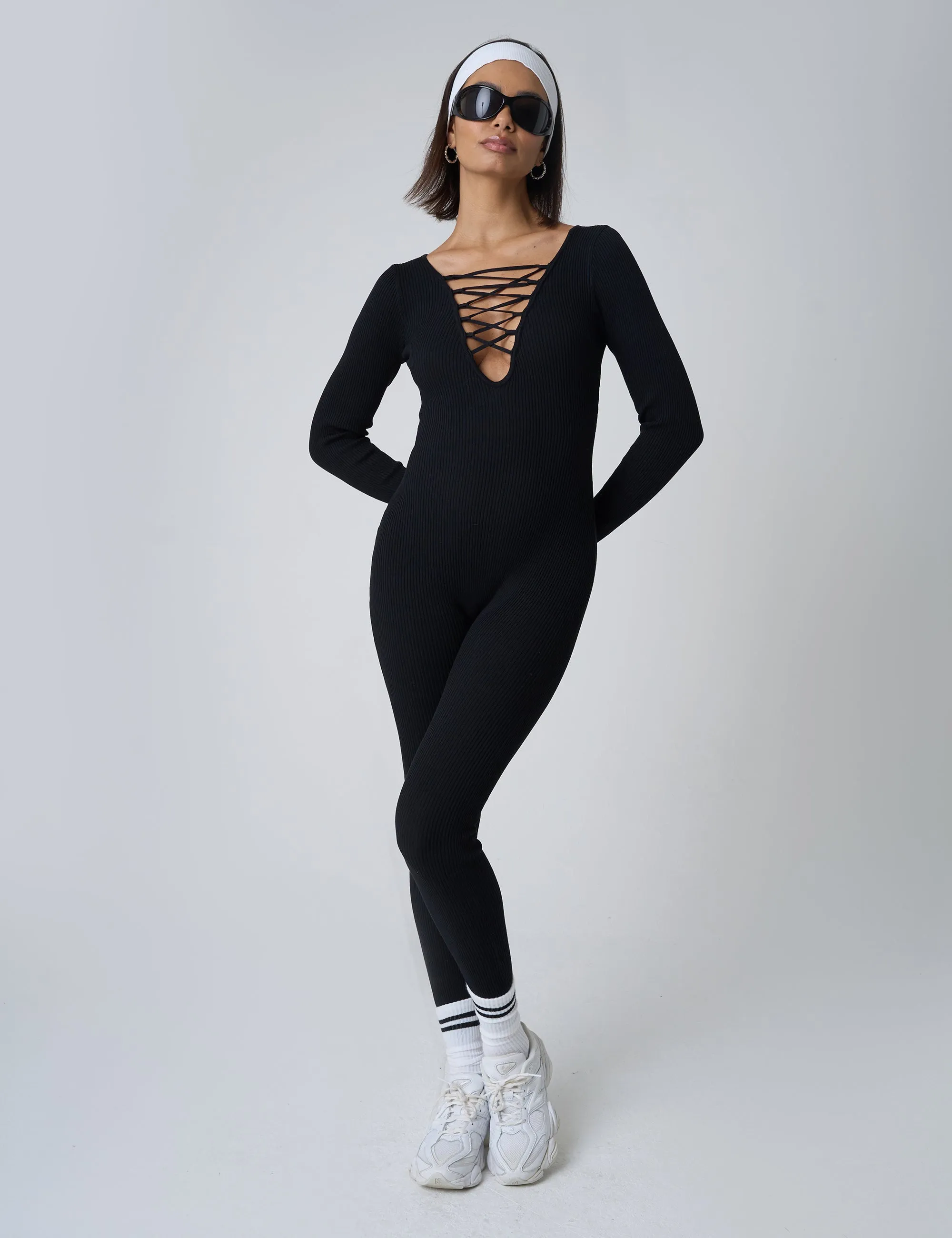 Tie Front Ribbed Long Sleeve Unitard Black sold by Public Desire