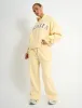 Kaiia Slogan Oversized Hoodie Soft Yellow & Grey sold by Public Desire