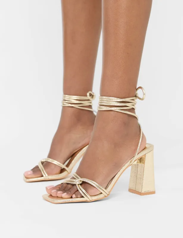 Schiffer Gold Cracked Pu Lace Up Block Heels sold by Public Desire