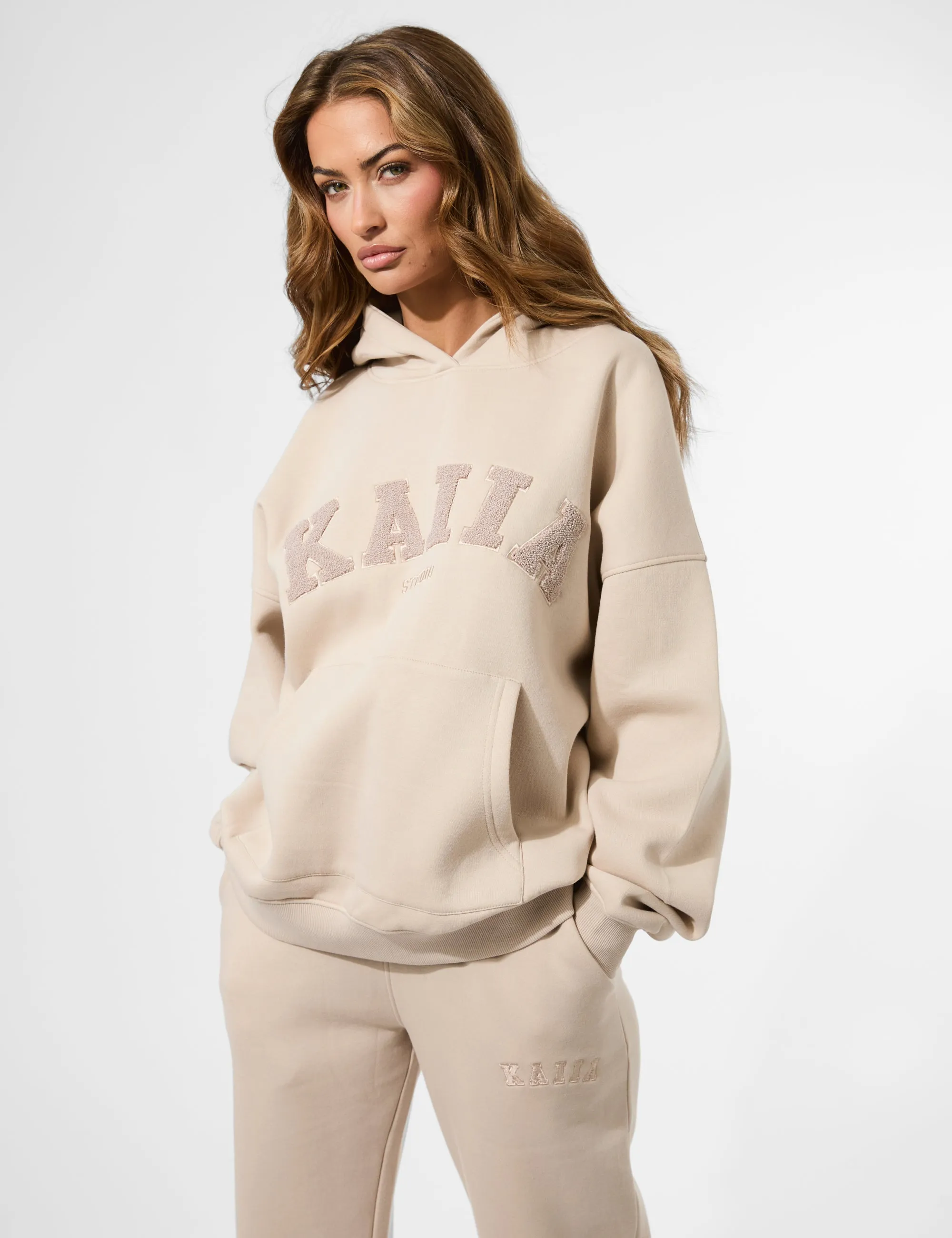 Kaiia Studio Borg Slogan Oversized Hoodie Truffle sold by Public Desire