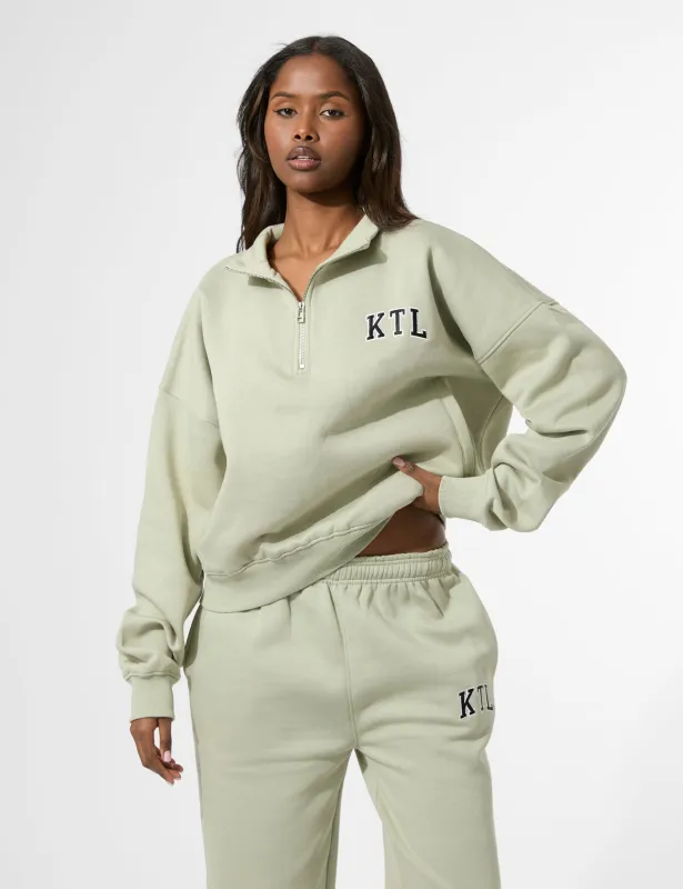 Kaiia KTL Logo Oversized Quarter Zip Sweatshirt Sage sold by Public Desire