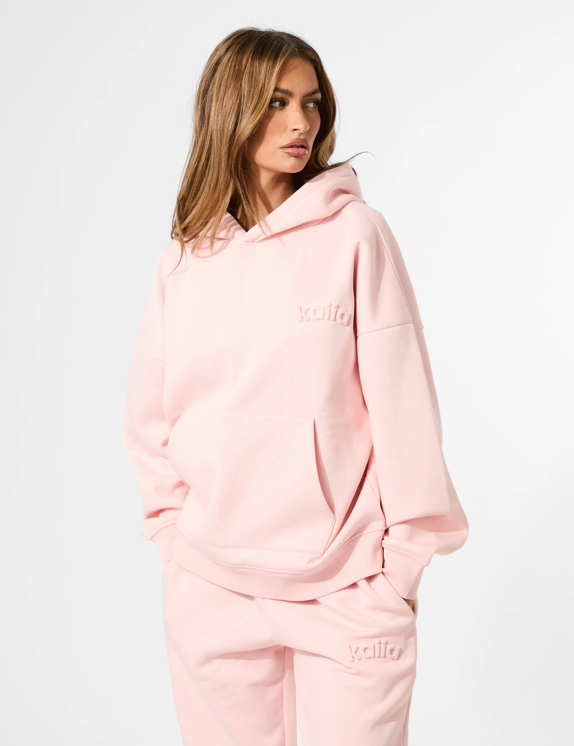 Kaiia Embossed Logo Oversized Hoodie Sugar Pink sold by Public Desire