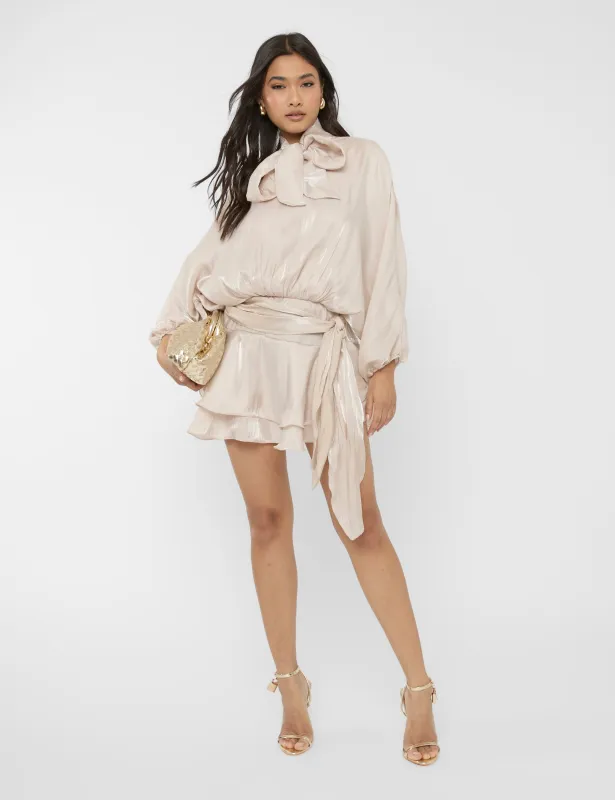 Long Sleeve Bow Detail Mini Dress Beige sold by Public Desire