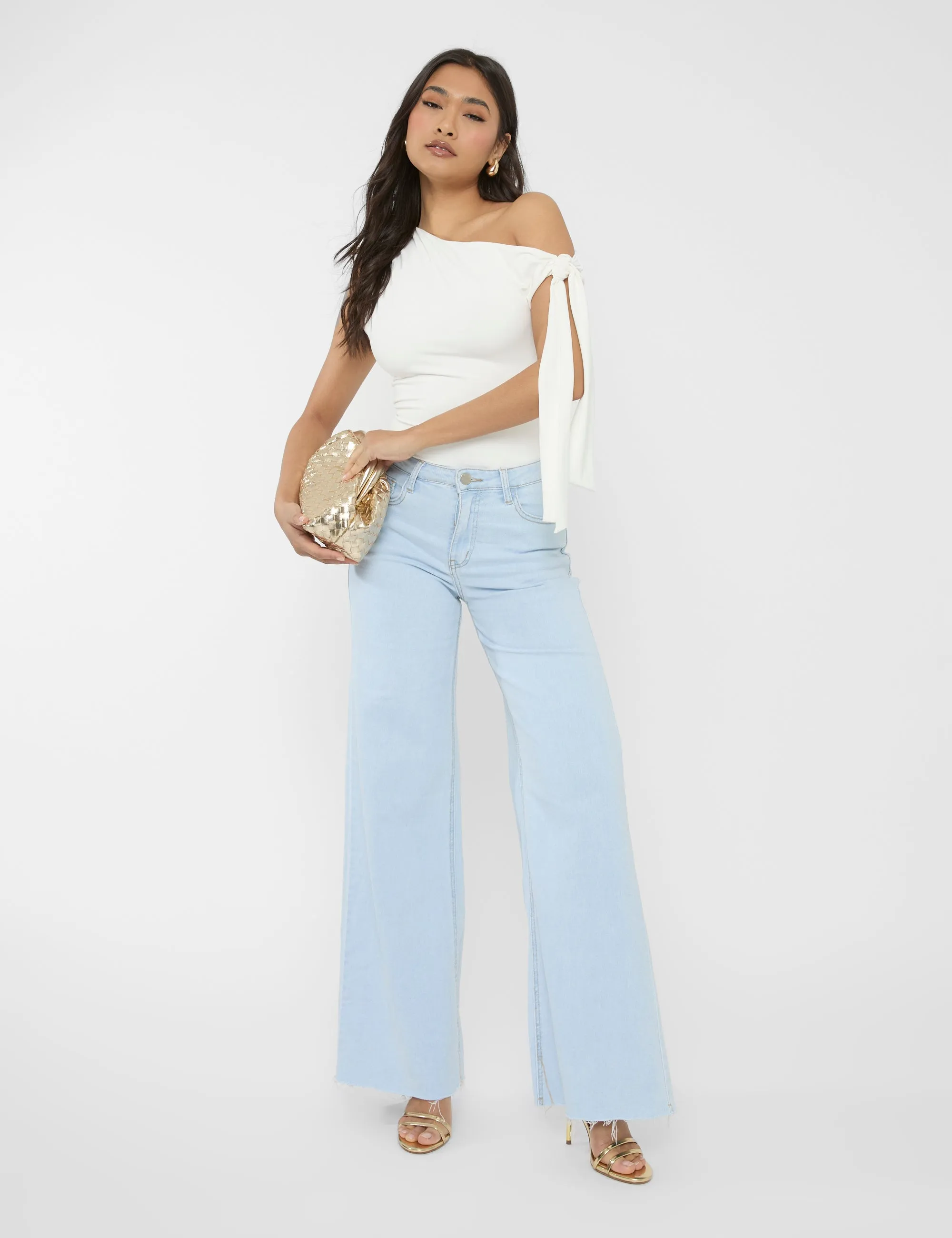 Mid Rise Wide Leg Jeans Light Blue sold by Public Desire