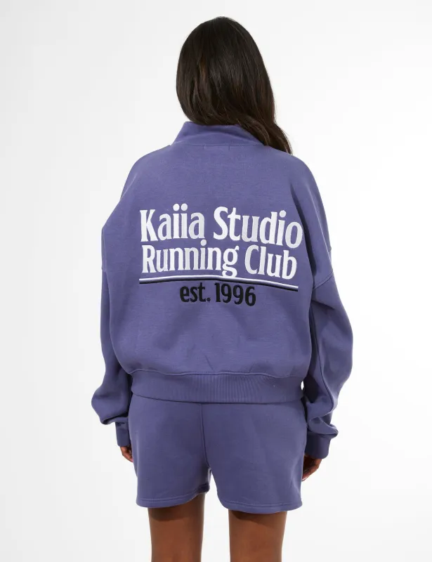Kaiia Running Club Logo Quarter Zip Sweatshirt Light Navy sold by Public Desire