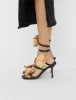 Lotus Black Satin & Gold Flower Trim Wrap Around Flared Stiletto High Heels sold by Public Desire