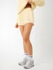 Kaiia Logo Mini Sweat Shorts Soft Yellow & Grey sold by Public Desire