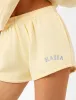 Kaiia Logo Mini Sweat Shorts Soft Yellow & Grey sold by Public Desire