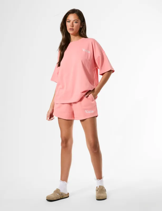 Kaiia Logo Mini Sweat Shorts Bright Coral sold by Public Desire