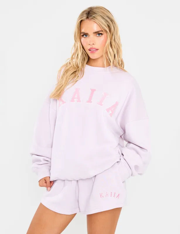 Kaiia Slogan Oversized Sweatshirt Pale Lavender sold by Public Desire