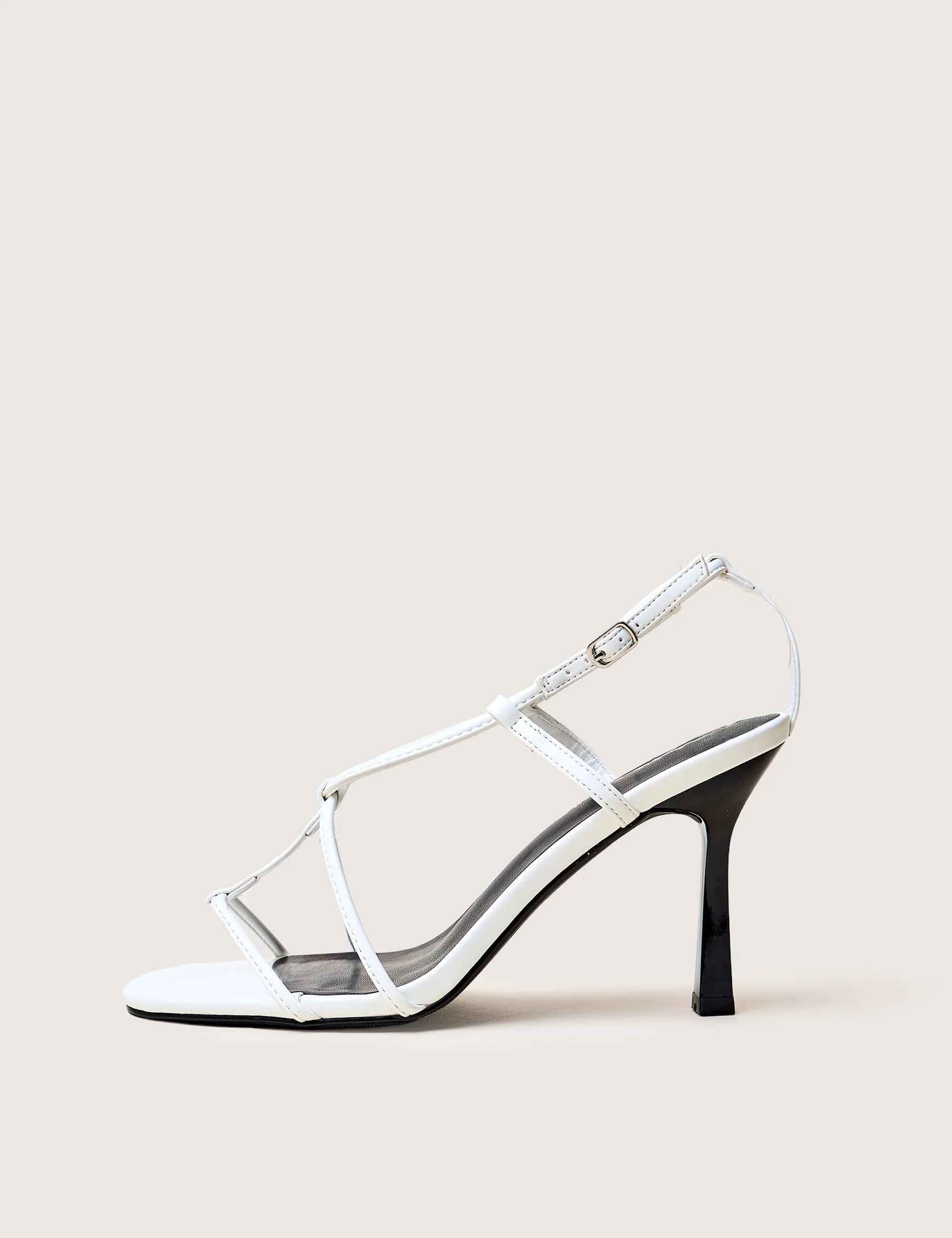 Marie White Pu T Bar Strappy Mid Heels sold by Public Desire