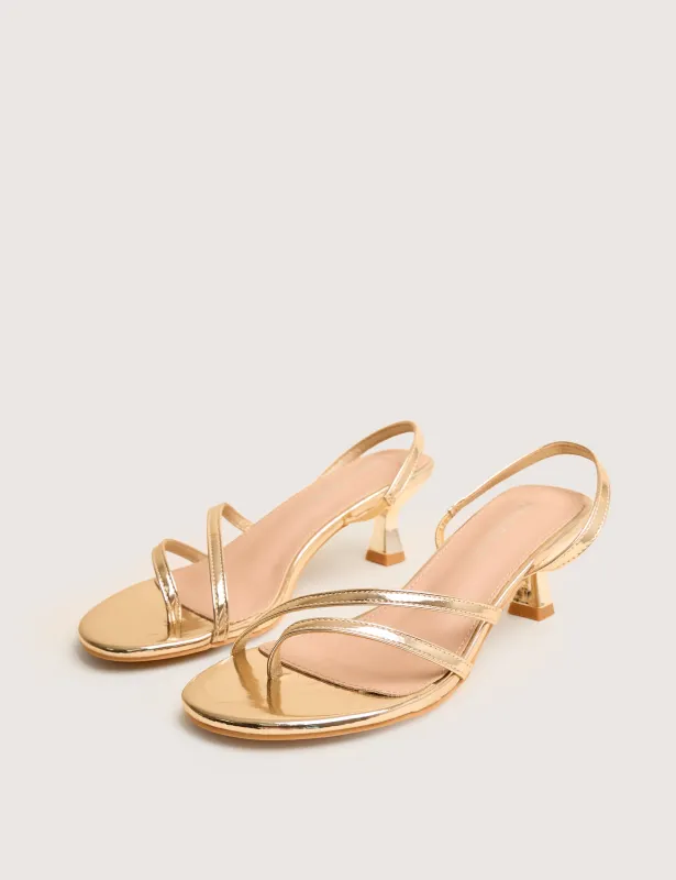 Helios Gold Mirror Pu Asymmetric Toe Strap Sling Back Mid Heels sold by Public Desire