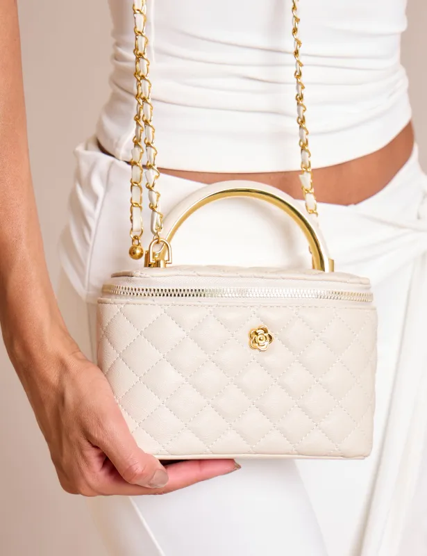 The Florence Top Handle Quilted Vanity Bag Cream sold by Public Desire