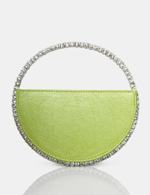 The Alessia Metallic Green Pu Circle Diamante Mini Grab Bag sold by Public Desire
