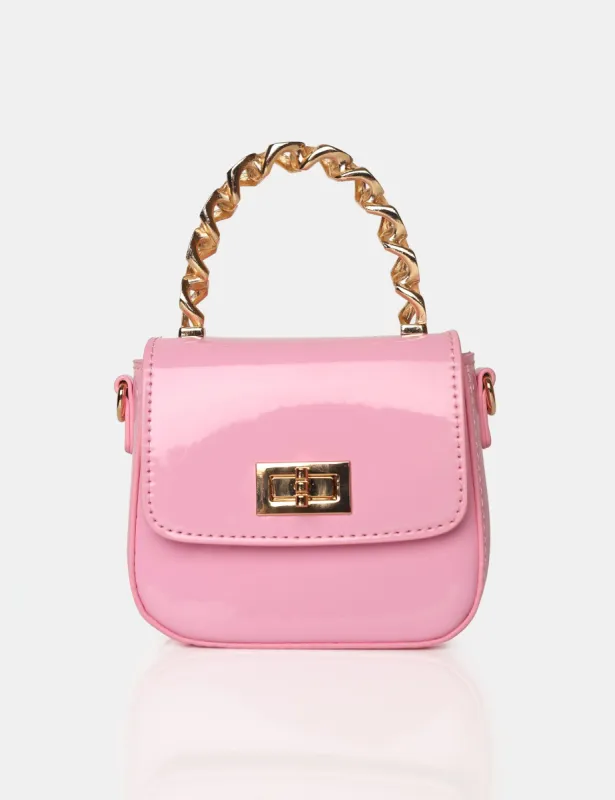 The Bridgerton Baby Pink Patenet Mini Bag sold by Public Desire
