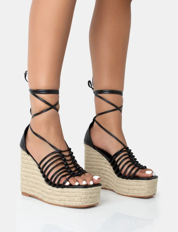 Reece Black PU Knot Strap Lace Up Raffia Wedge Heels sold by Public Desire