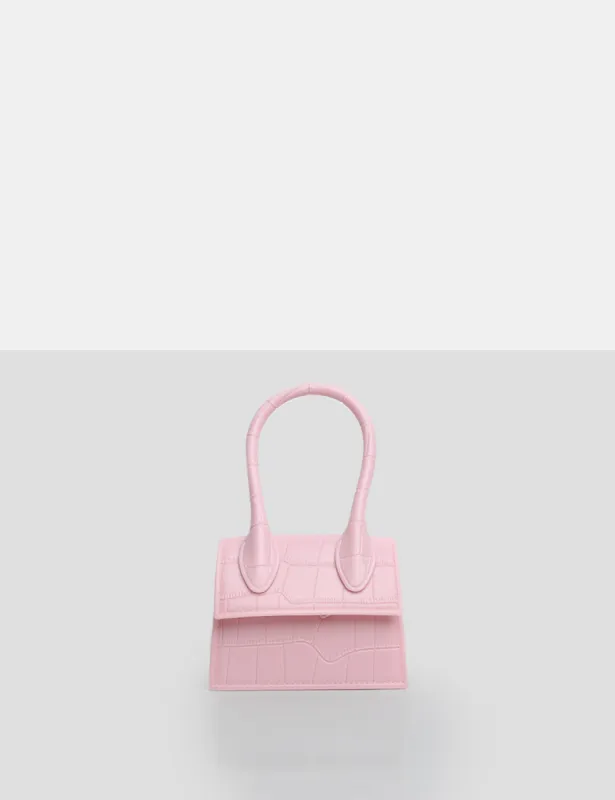 The Alora Pink Rubber Effect Mini Bag sold by Public Desire