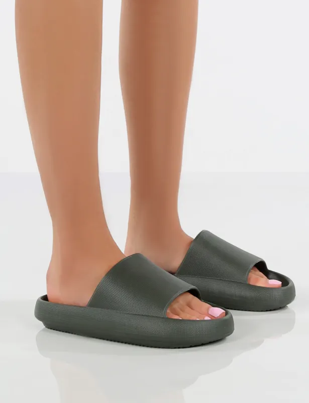 Solar Dark Grey Rubber Flat Sliders sold by Public Desire